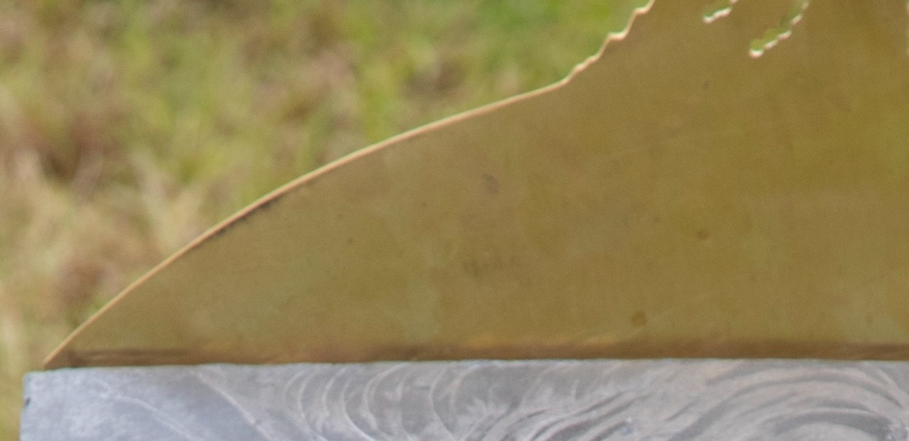 A hand-worked lead top
